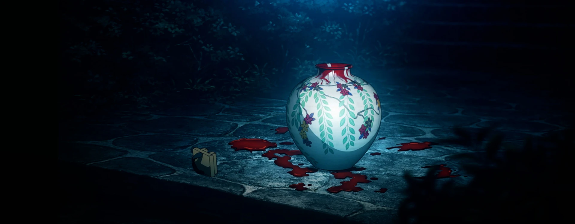 A blood-stained enchanted orb in a dark chamber